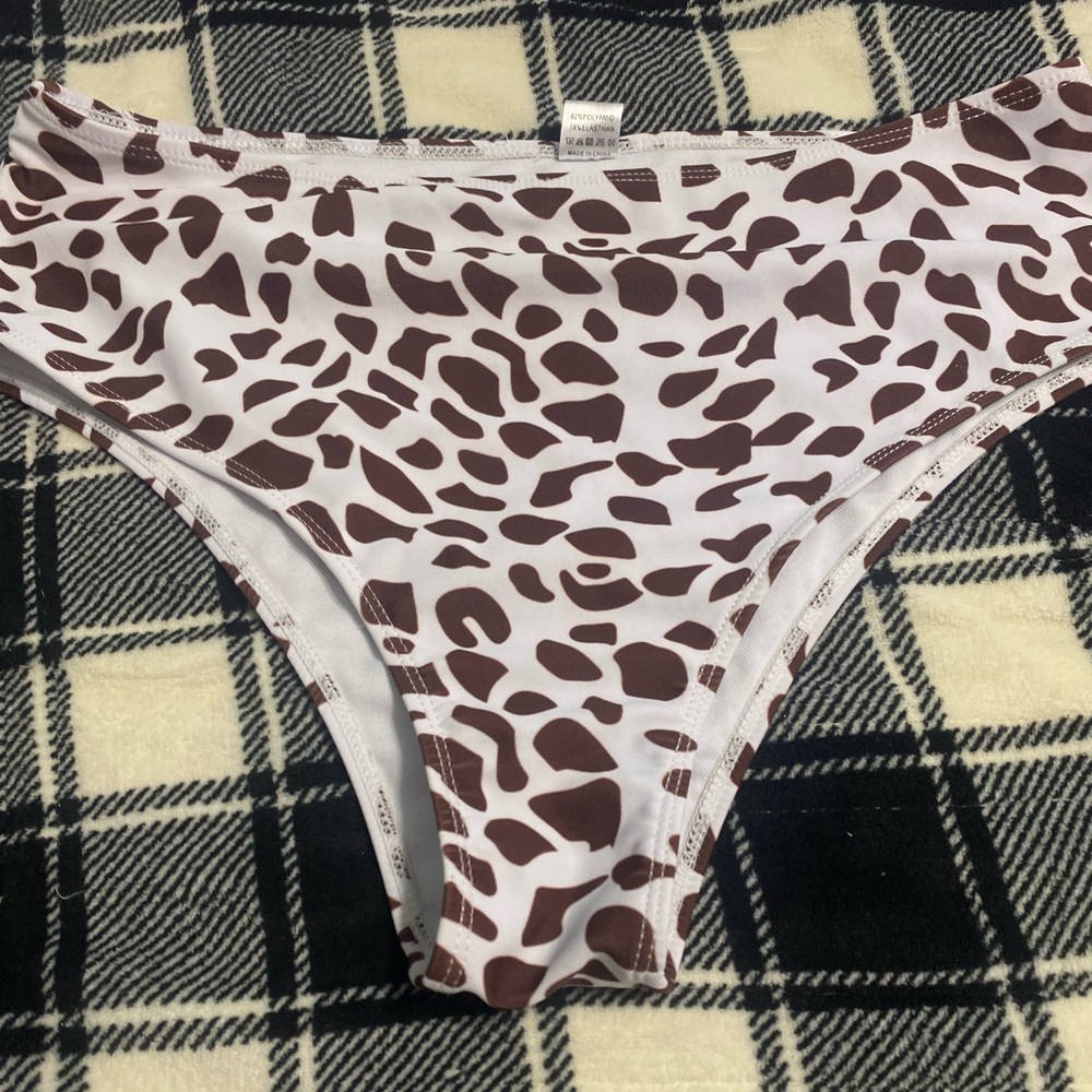 Size XL women’s swimsuit bottoms cow print
